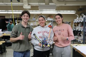 Students holding ME 201 crane project